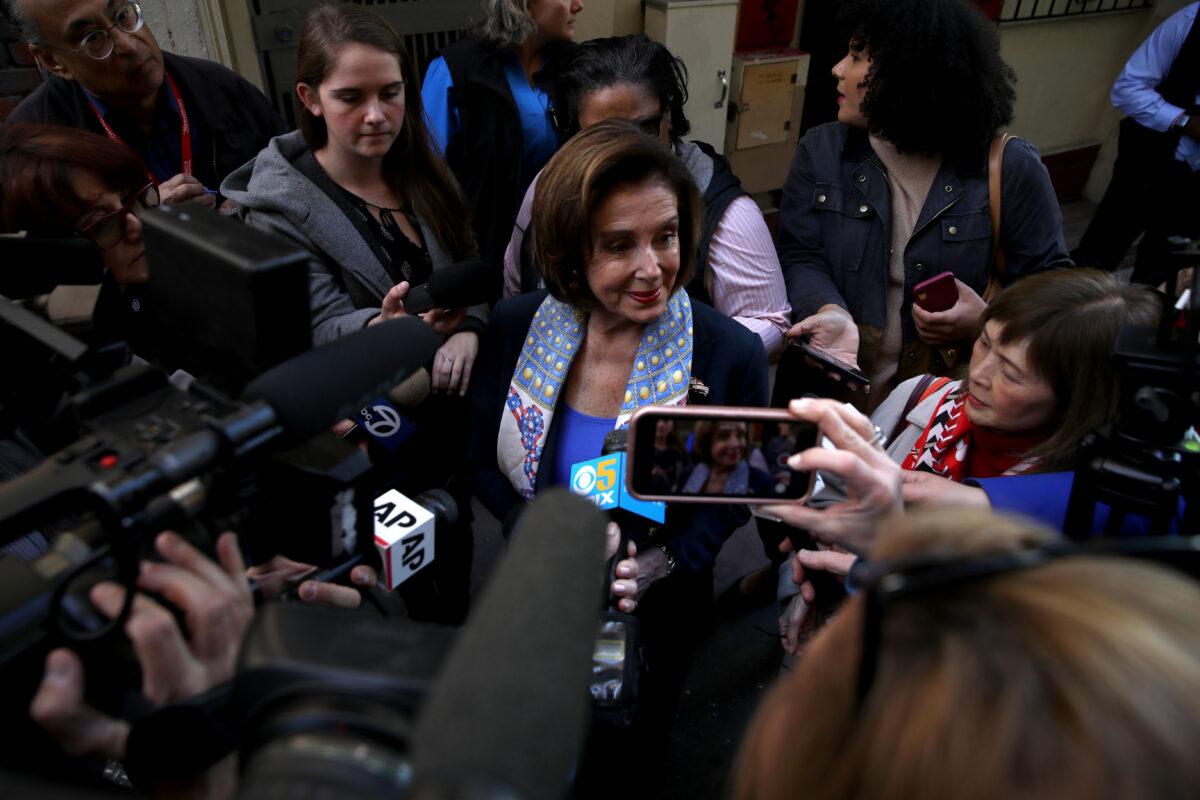 House Speaker Nancy Pelosi (C) (D-Calif.) tours San Francisco's Chinatown on February 24, 2020. (Justin Sullivan/Getty Images)