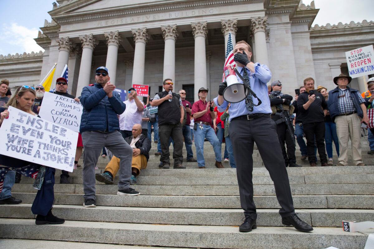 Gubernatorial candidate and anti-tax activist, Tim Eyman, speaks during a 'Hazardous Liberty! Defend the Constitution!' rally to protest the stay-at-home order, at the Capitol building in Olympia, Washington on April 19, 2020. (Karen Ducey/Getty Images)