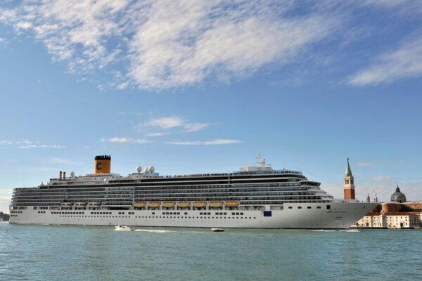 The Costa Deliziosa cruise ship sails past St. Mark’s Square, visible in background, in Venice, Italy, on May 24, 2015. (Luigi Costantini/AP)