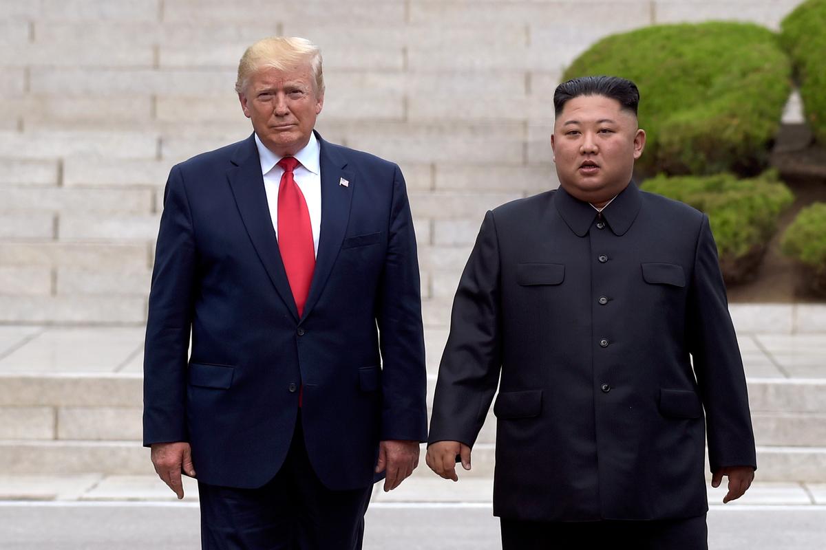President Donald Trump meets with North Korean leader Kim Jong Un at the North Korean side of the border at the village of Panmunjom in the Demilitarized Zone, on June 30, 2019. (Susan Walsh/AP Photo)