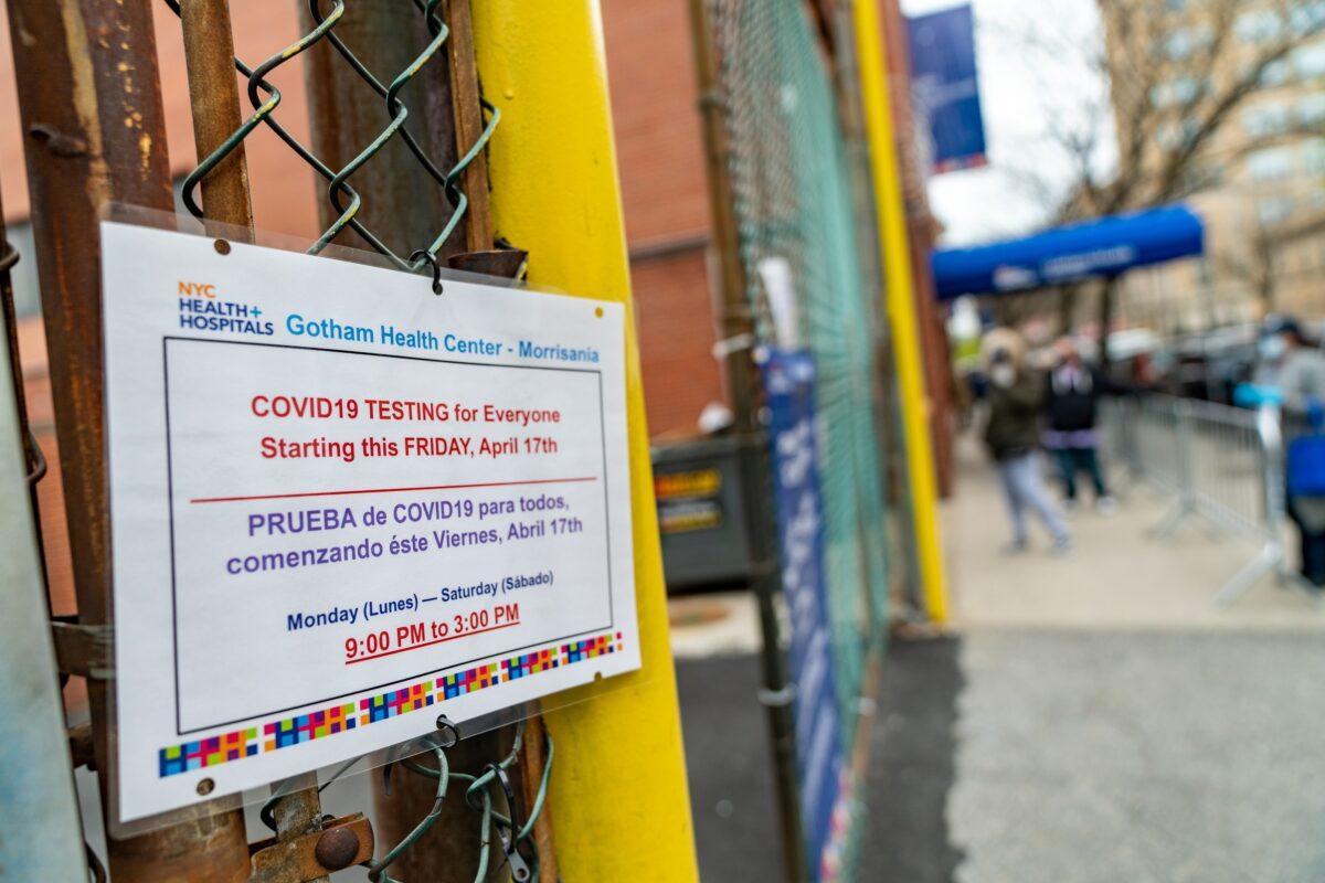 A sign announcing COVID-19 at NYC Health + Hospitals/Gotham Health in Morrisania in the Bronx borough of New York City on April 20, 2020. (David Dee Delgado/Getty Images)