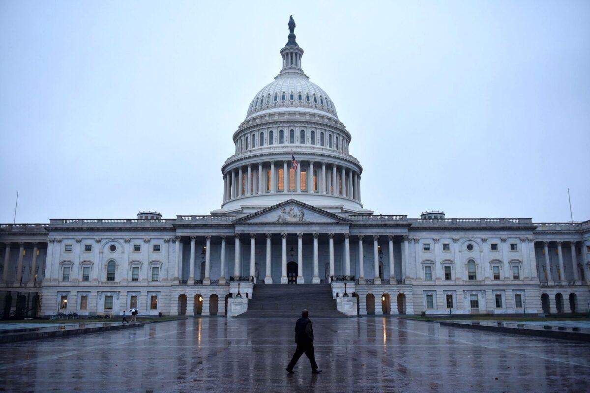 A man walks in front of the U.S. Capitol in Washington on Nov. 6, 2018. (Mandel Ngan/AFP/Getty Images)