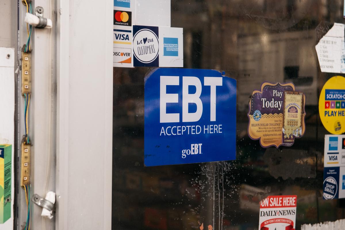 A sign alerting customers about SNAP food stamps benefits is displayed at a Brooklyn grocery store in New York City on Dec. 5, 2019. (Scott Heins/Getty Images)