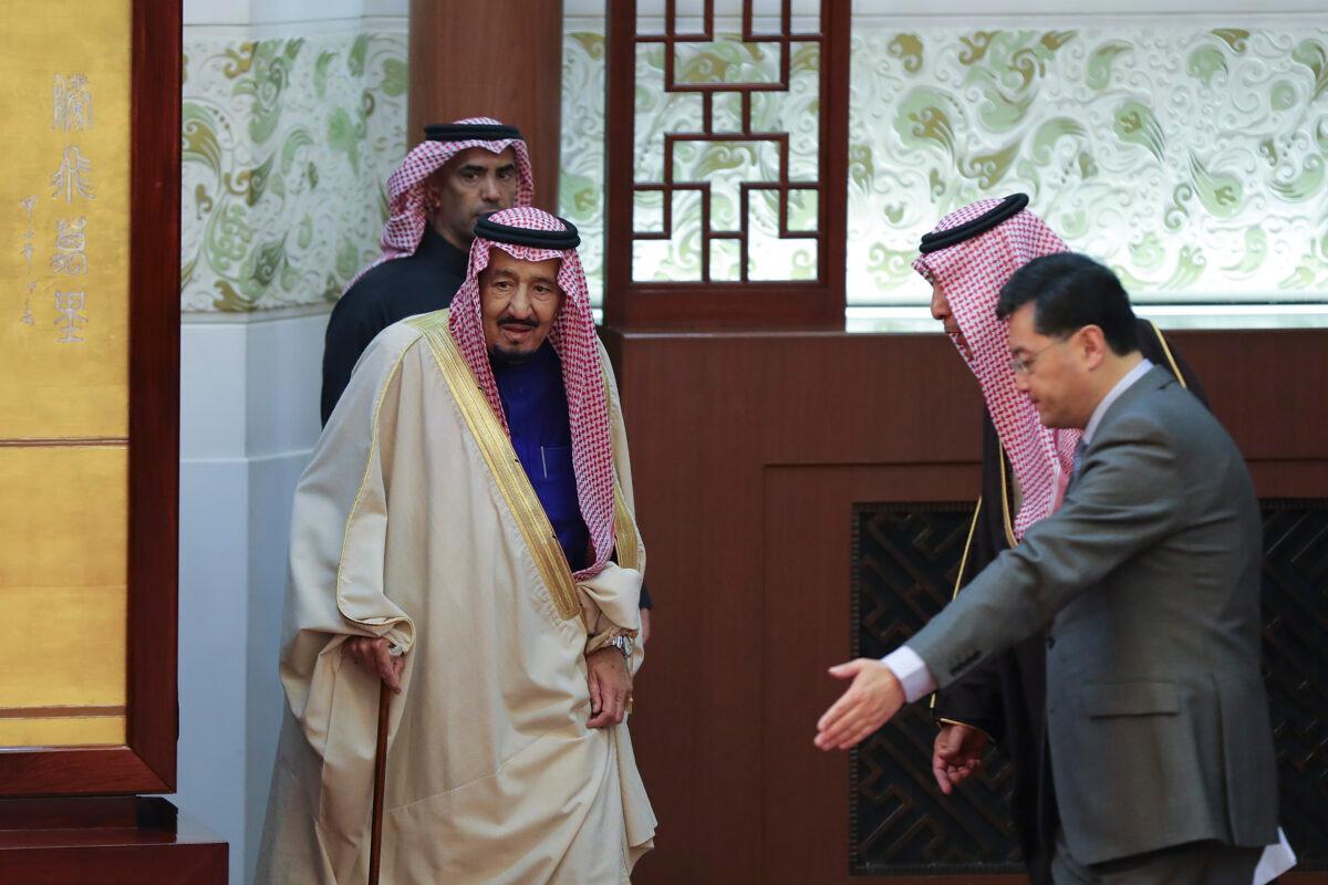 Saudi King Salman bin Abdulaziz (left) arrives to attend a signing ceremony at the Great Hall of the People in Beijing on March 16, 2017. Chinese leader Xi Jinping welcomed visiting Saudi King Salman in Beijing as China continues a charm offensive toward the Middle East. (Lintao Zhang/AFP via Getty Images)