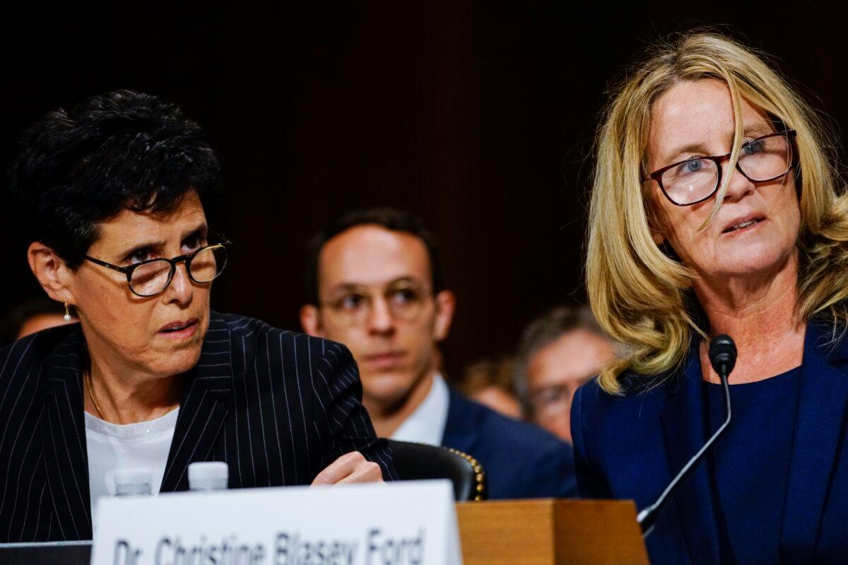 Dr. Christine Blasey Ford, with lawyer Debra Katz (L), answers questions at a Senate Judiciary Committee hearing in the Dirksen Senate Office Building on Capitol Hill in Washington in September 2018. (Melina Mara-Pool/Getty Images)