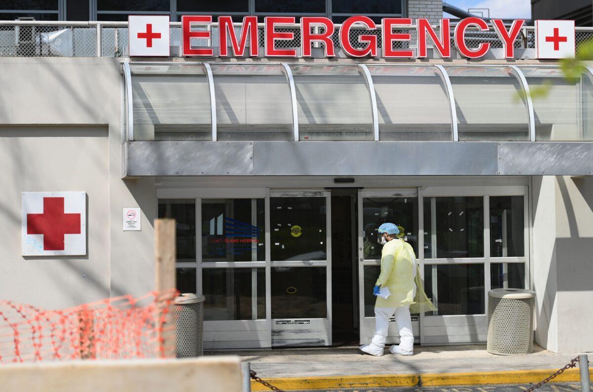 A medical worker enters the emergency room at a hospital in Brooklyn, New York City, on April 15, 2020. (Angela Weiss/AFP via Getty Images)
