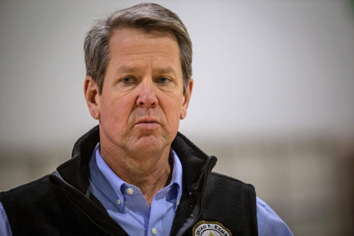 Georgia Gov. Brian Kemp listens to a question from the press during a tour of a temporary hospital at the Georgia World Congress Center in Atlanta on April 16, 2020. (Ron Harris/AP Photo)