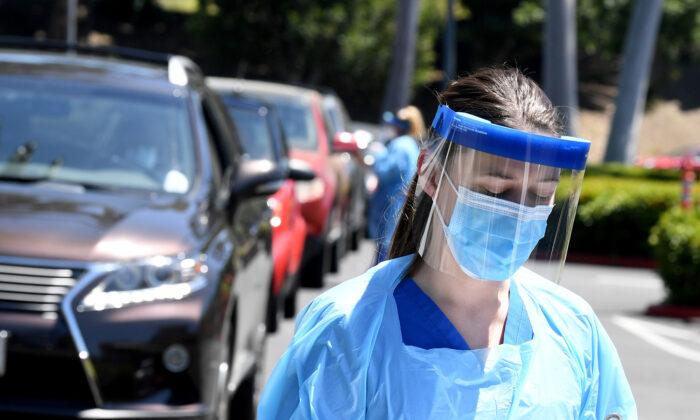 Masked Medics Face Off Against Anti-Lockdown Protestors Refusing to Self-Quarantine in Colorado