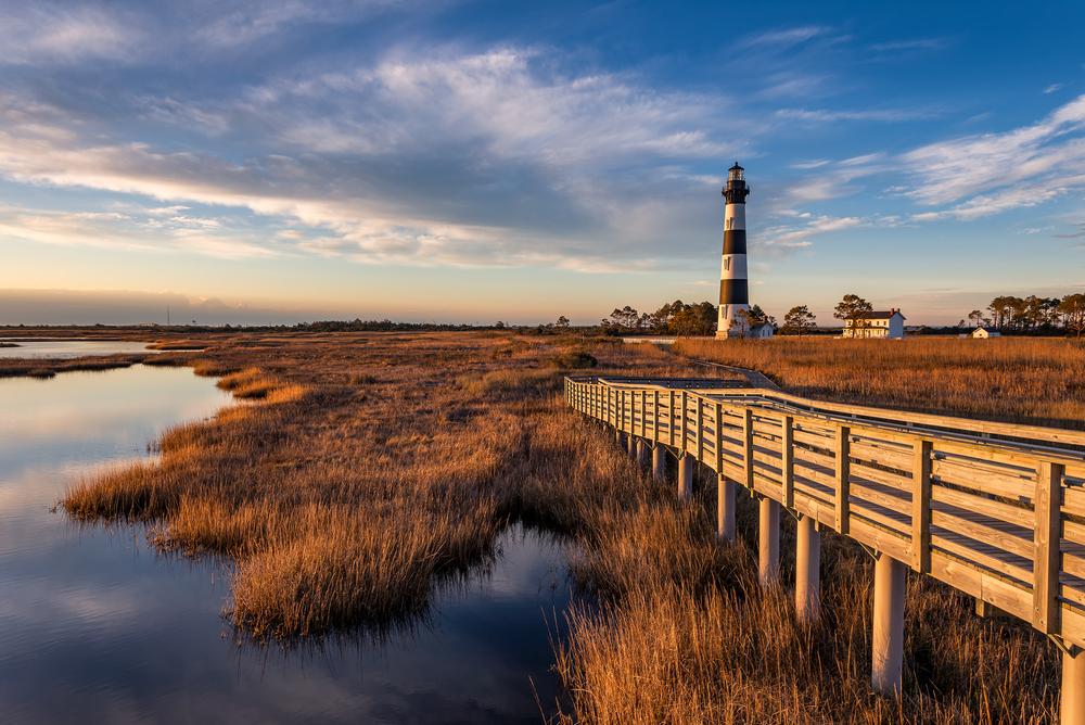 Dawn at Bodie Island Lighthouse along North Carolina's Outer Banks.<br/>(anthony heflin/Shutterstock)