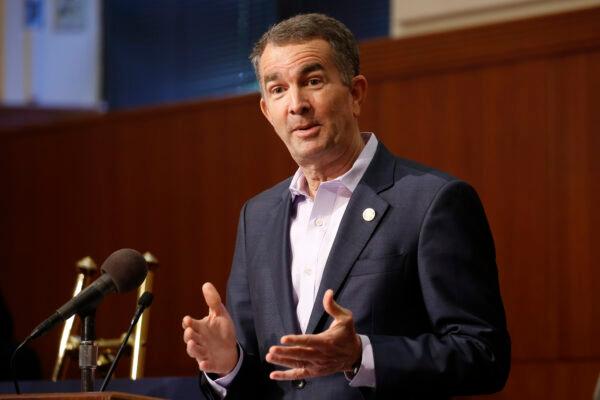 Virginia Gov. Ralph Northam gestures during a news conference at the Capitol in Richmond on April 8, 2020. (Steve Helber/AP Photo)