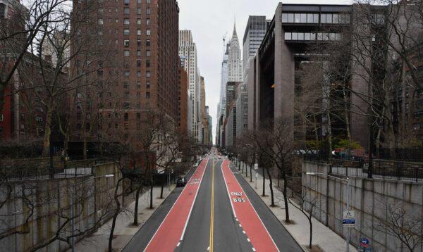 A nearly empty 42nd Street is viewed in New York City on March 25, 2020. (Angela Weiss/AFP via Getty Images)