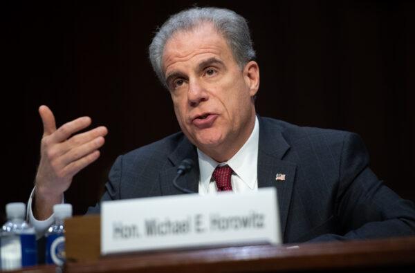 Justice Department Inspector General Michael Horowitz testifies at a hearing in Washington, on Dec. 11, 2019. (Saul Loeb/AFP/Getty Images)