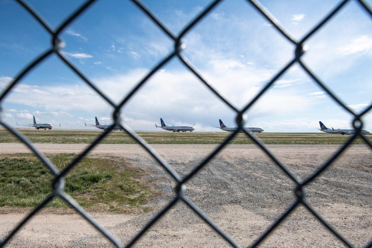 United Airlines planes sit parked on a runway at Denver International Airport amid the sharp decrease in flights due to the COVID-19 pandemic, on April 22, 2020. (Michael Ciaglo/Getty Images)