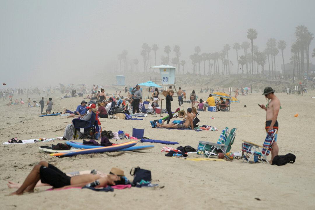 Beach Crowds Lead California to Step up Enforcement of CCP Virus Restrictions