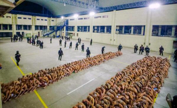 Gang members are secured during a police operation at Izalco jail during a 24-hour lockdown in Izalco, El Salvador, on April 25, 2020. (El Salvador Presidency/Handout via Reuters)