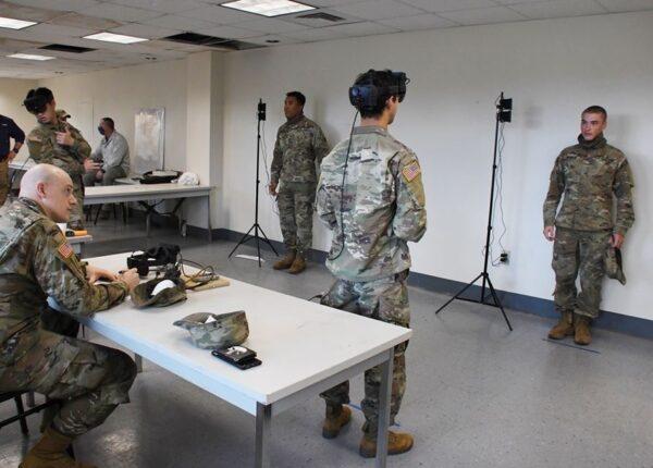 Soldiers at Fort Benning, Ga., take the temperature of trainees using sensors in a modified version of the Integrated Visual Augmentation System, known as IVAS goggles, in this undated handout. (DoD/(Bridgett Siter)