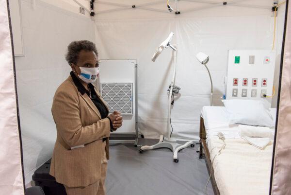 Chicago Mayor Lori Lightfoot tours the COVID-19 alternate care facility constructed at the McCormick Place convention center in Chicago, Illinois on April 17, 2020. (Tyler LaRiviere - Pool/Getty Images)