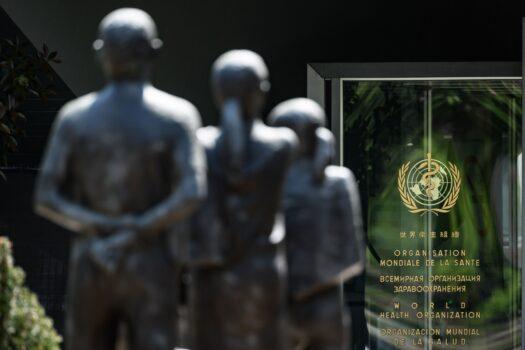 Statues facing the entrance of the World Health Organization (WHO) headquarters in Geneva, Switzerland, on April 24, 2020. (Fabrice Coffrini/AFP via Getty Images)