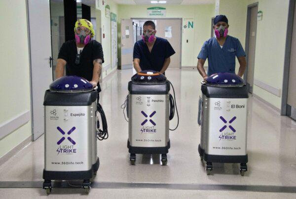 During the COVID-19 coronavirus pandemic, personnel of the Health sector get ready to disinfect an area of the Intermediate Care Unit of the Social Security Institute (IESS) Quito Sur Hospital with the help of robots, in Quito, Ecuador, on April 29, 2020. (Rodrigo Buendia/AFP via Getty Images)