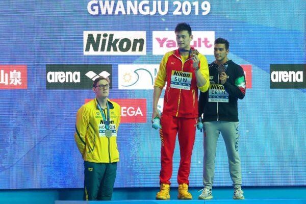 (L-R) Silver medalist Mack Horton of Australia, gold medalist Sun Yang of China, and bronze medalist Gabriele Detti of Italy pose during the medal ceremony for Men's 400m Freestyle Final on day one of the Gwangju 2019 FINA World Championships at Nambu International Aquatics Centre in Gwangju, South Korea on July 21, 2019 . (Maddie Meyer/Getty Images)