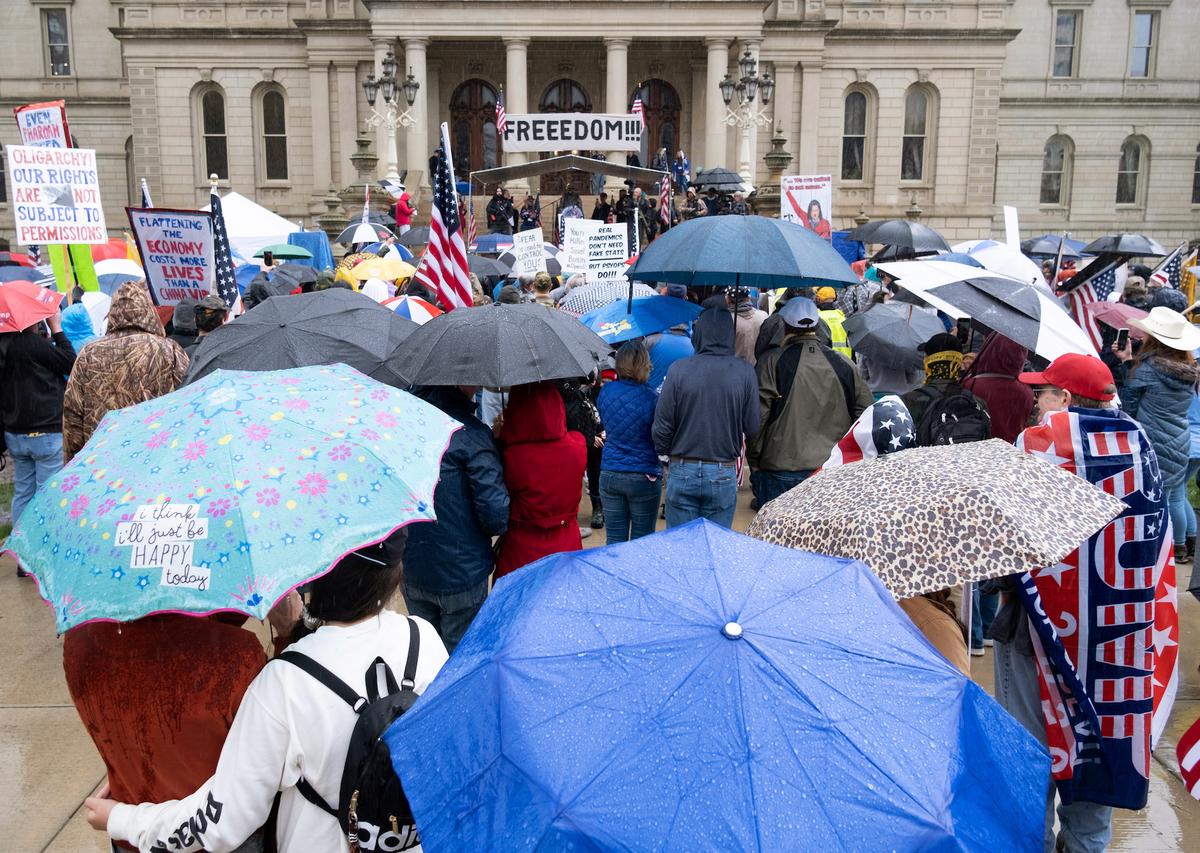 Protesters gather outside the state capitol building before the vote on the extension of Gov. Gretchen Whitmer's emergency declaration stay-at-home order, in Lansing, Michigan, on April 30, 2020. (Seth Herald/Reuters)