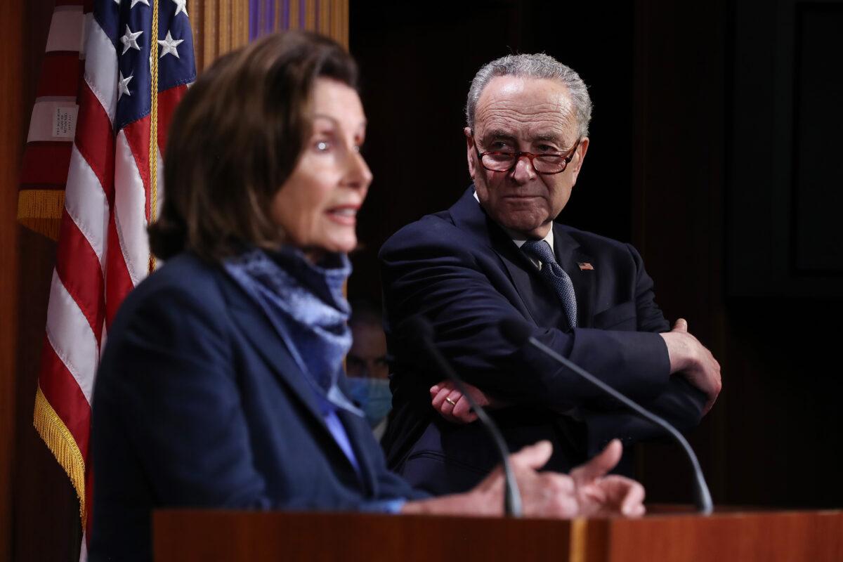 House Speaker Nancy Pelosi (D-Calif.) and Senate Minority Leader Charles Schumer (D-N.Y.) talk to reporters at the U.S. Capitol in Washington on April 21, 2020. (Chip Somodevilla/Getty Images)