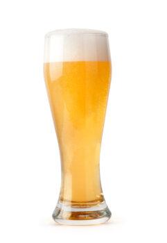 The tall weizen glass accommodates the half-liter bottles many German wheat beers come in, with a narrowed waist that collects the residual yeast often remaining in the bottle. (Spaxiax/Shutterstock)