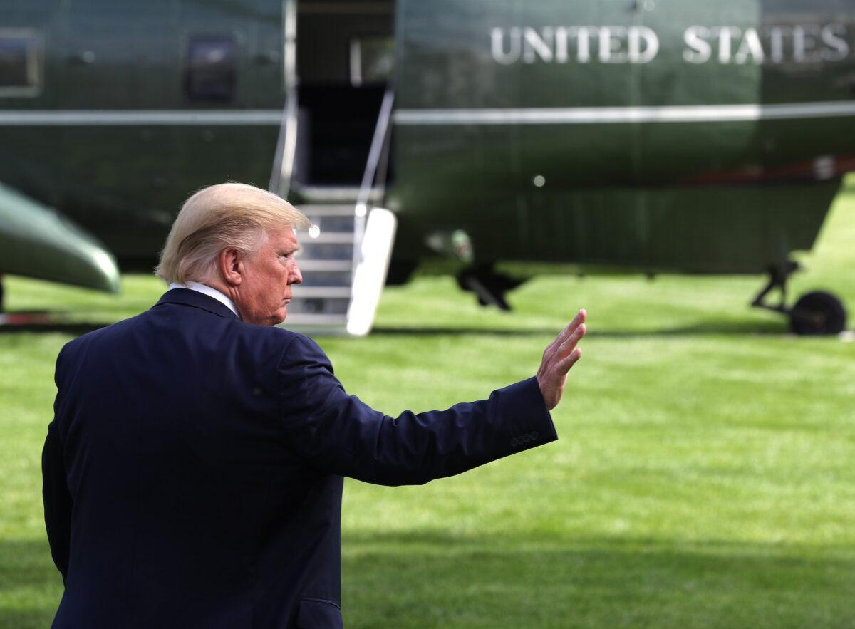 President Donald Trump waves while departing from the White House for Camp David in Washington on May 1, 2020. (Chip Somodevilla/Getty Images)