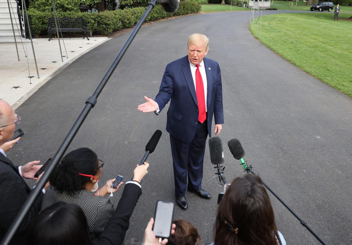 President Donald Trump talks to journalists on the South Lawn while departing the White House for Camp David, in Washington on May 1, 2020. (Chip Somodevilla/Getty Images)