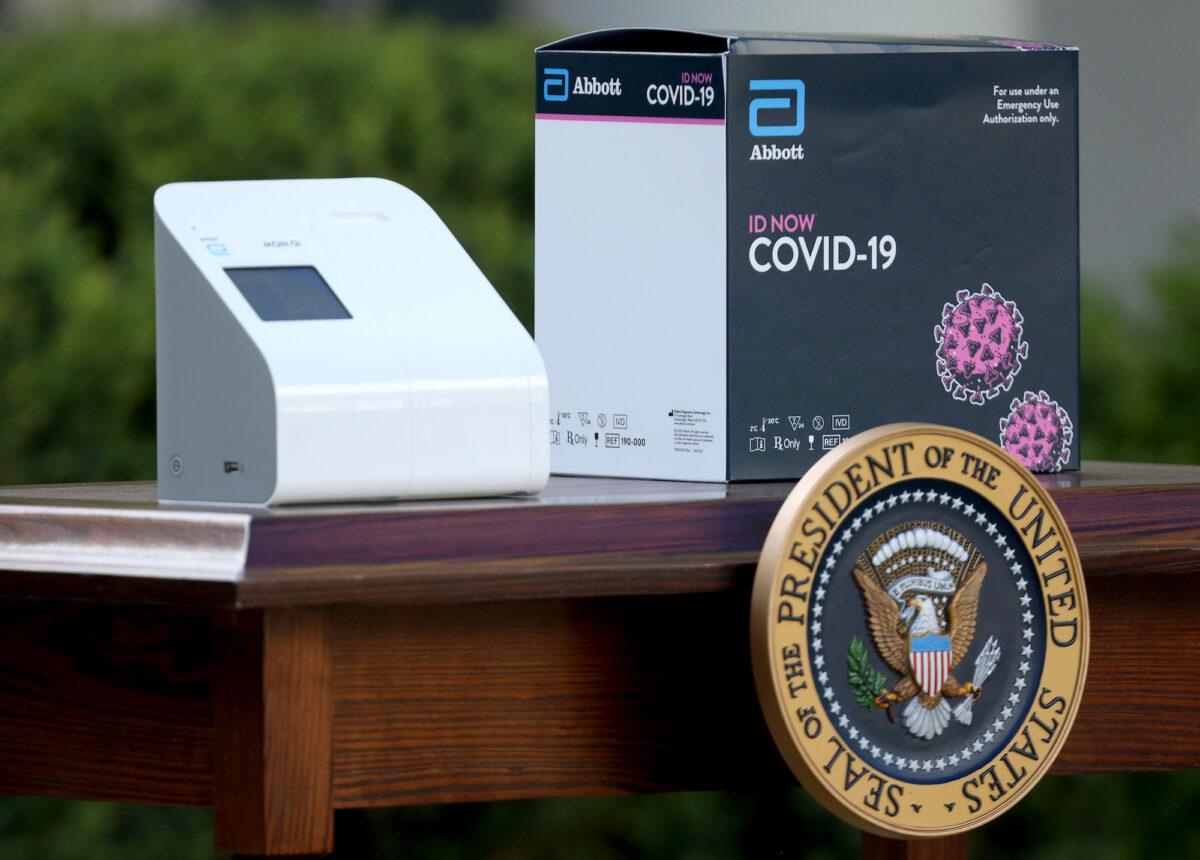 A new COVID-19 test kit developed by Abbott Labs was introduced during the daily CCP virus briefing in the Rose Garden of the White House in Washington on March 30, 2020. (Win McNamee/Getty Images)