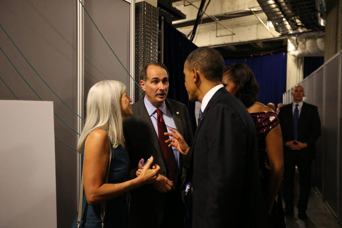 President Barack Obama and First Lady Michelle Obama with senior campaign adviser David Axelrod in Charlotte, N.C. (Doug Mills-Pool/Getty Images)