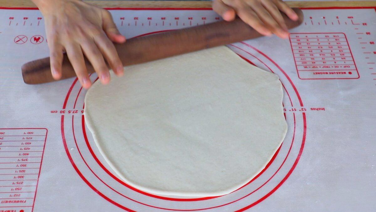 Roll each ball of dough into a thin, 10-inch round. (Photo by CiCi Li)