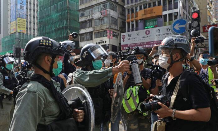 Photojournalist Risks His Life in Hong Kong