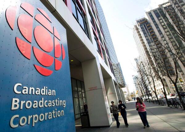 People walk into the CBC building in Toronto in a file photo. (The Canadian Press/Nathan Denette)
