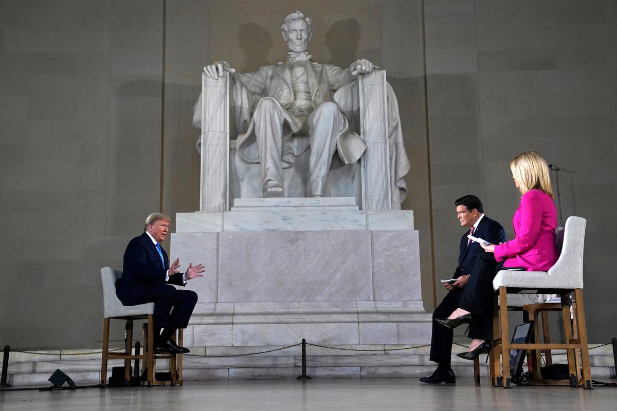 President Donald Trump speaks during a Fox News virtual town hall from the Lincoln Memorial in Washington on May 3, 2020. (AP Photo/Evan Vucci)