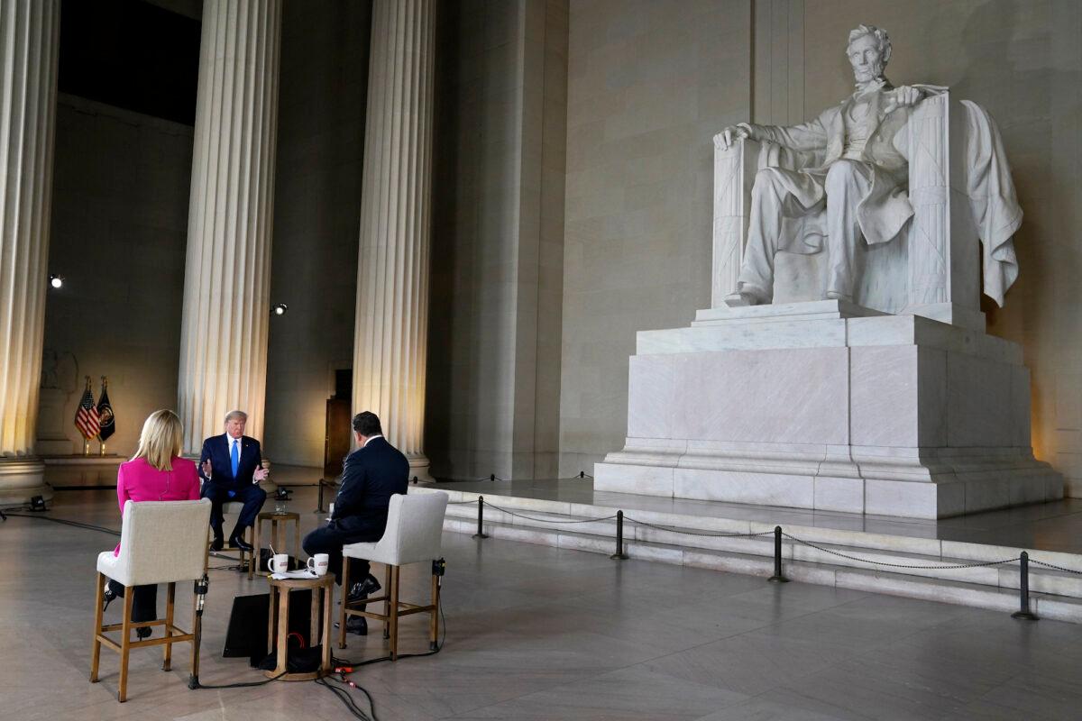 President Donald Trump speaks during a Fox News virtual town hall from the Lincoln Memorial, in Washington, on May 3, 2020. (AP Photo/Evan Vucci)
