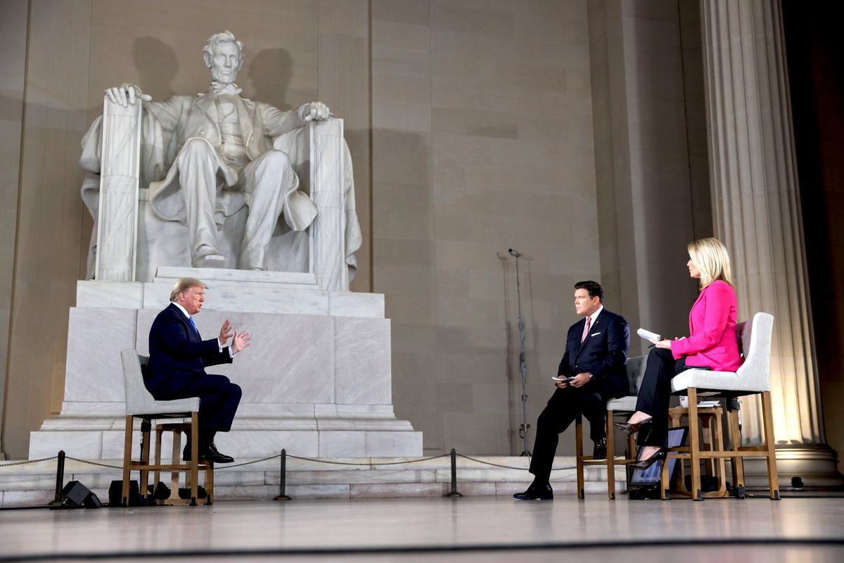 President Donald Trump speaks with news anchors Bret Baier and Martha MacCallum during a Virtual Town Hall inside of the Lincoln Memorial in Washington on May 3, 2020. (Oliver Contreras-Pool/Getty Images)