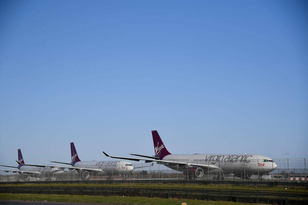 Virgin Atlantic planes are seen at Heathrow airport as the spread of COVID-19 continues, London, Britain, March 31, 2020. (Toby Melville/Reuters)