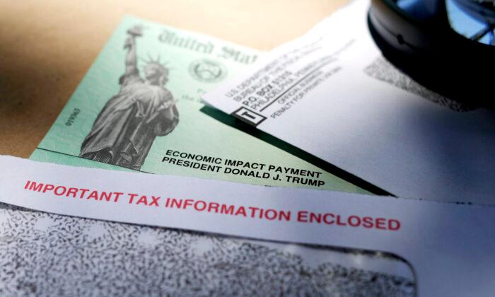IRS Alerts Millions of Americans to Check Their Mail for Stimulus Debit Cards