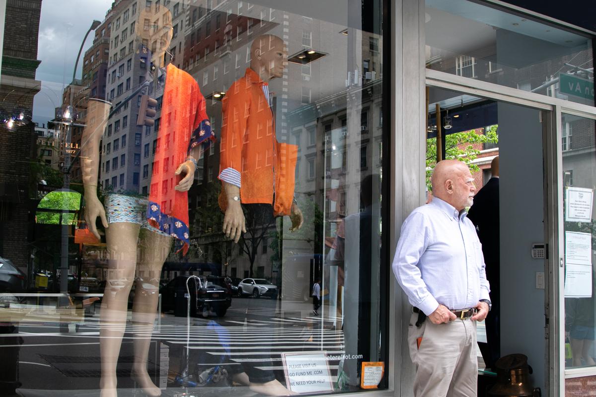 Eliot Rabin, owner of Peter Elliot Blue stands in front of the display window of his store in Manhattan, New York on May 4, 2020. (Chung I Ho/The Epoch Times)