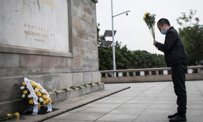 Man Raises Money to Remember Virus Victims in China, Is Threatened by Police