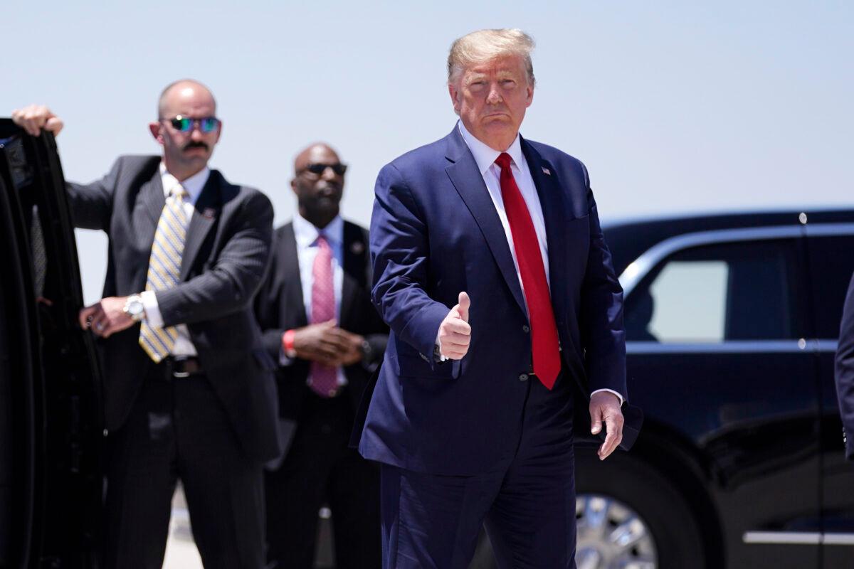 President Donald Trump arrives in Phoenix, Ariz., on May 5, 2020. (Evan Vucci/AP Photo)