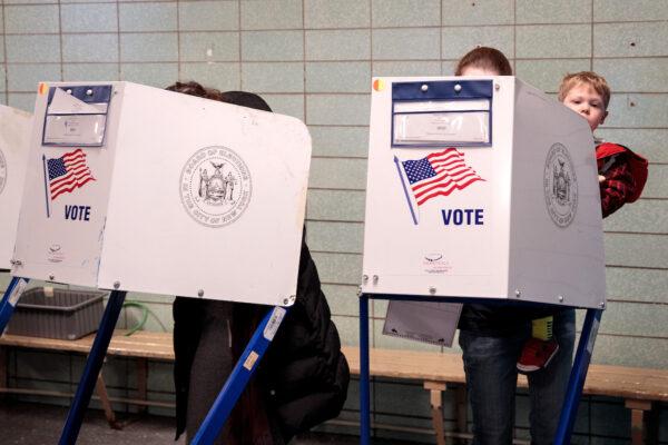 People vote at a polling site at a public school in New York City, on Nov. 8, 2016. (Drew Angerer/Getty Images)