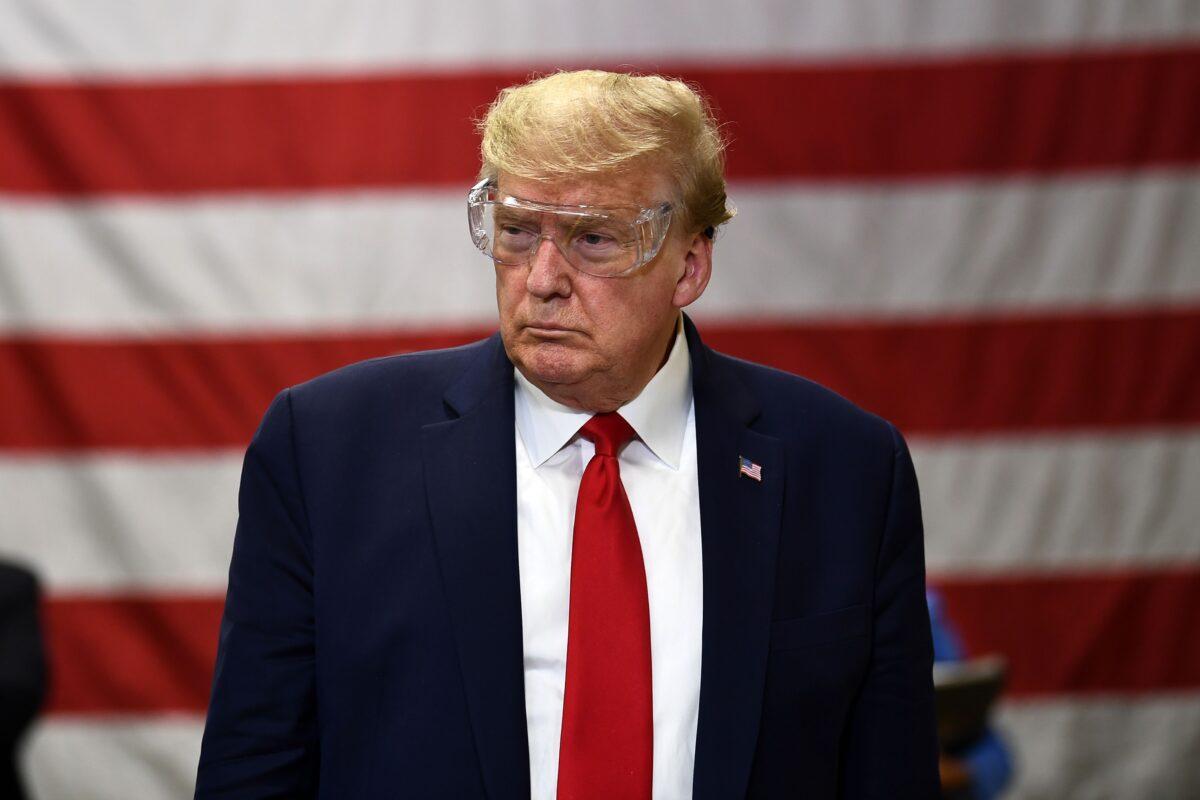 President Donald Trump participates in a tour of a Honeywell International plant that manufactures personal protective equipment in Phoenix, Ariz., on May 5, 2020. (Brendan Smialowski/AFP via Getty Images)