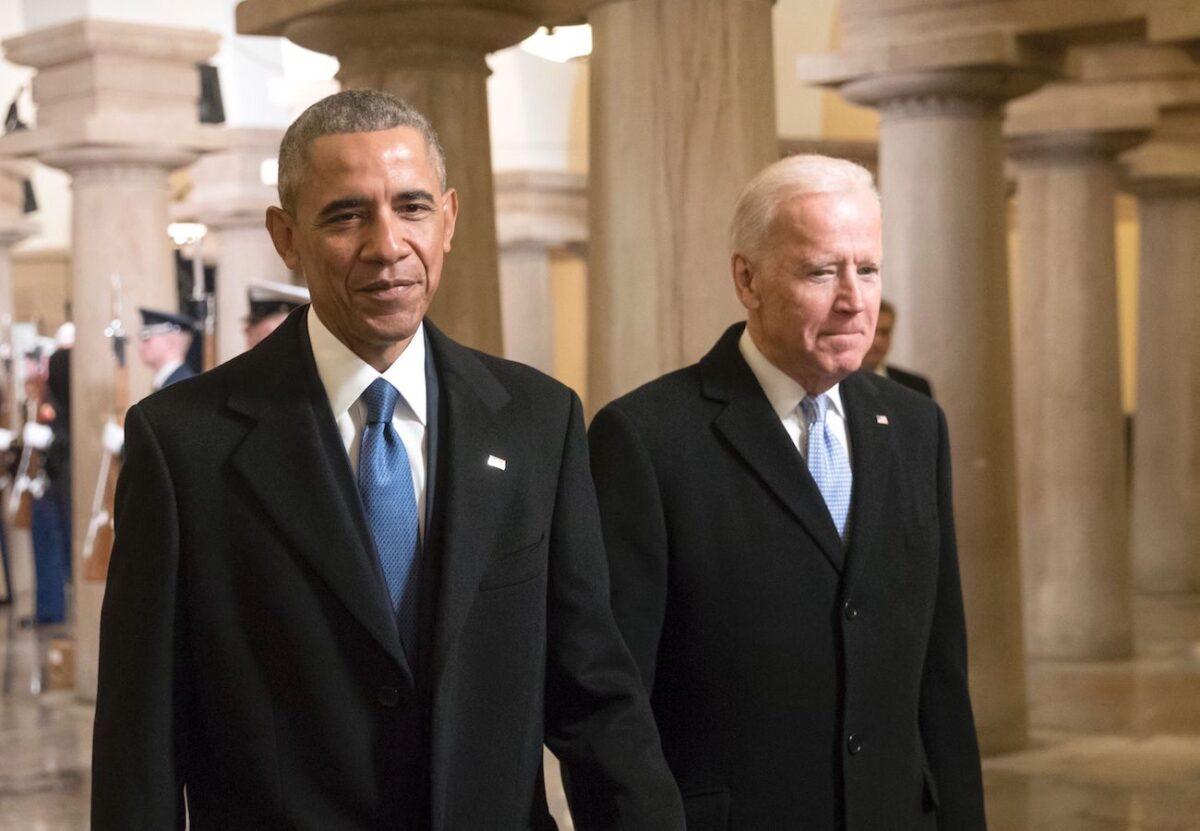 Former President Barack Obama and former Vice President Joe Biden walk through the Crypt of the Capitol for Donald Trump's inauguration ceremony, in Washington, on Jan. 20, 2017. (J. Scott Applewhite/AFP via Getty Images)
