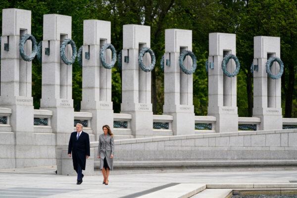 President Donald Trump and First Lady Melania Trump visit the World War II Memorial to commemorate the 75th anniversary of Victory in Europe Day, in Washington, on Fri., May 8, 2020. (Evan Vucci/AP Photo)