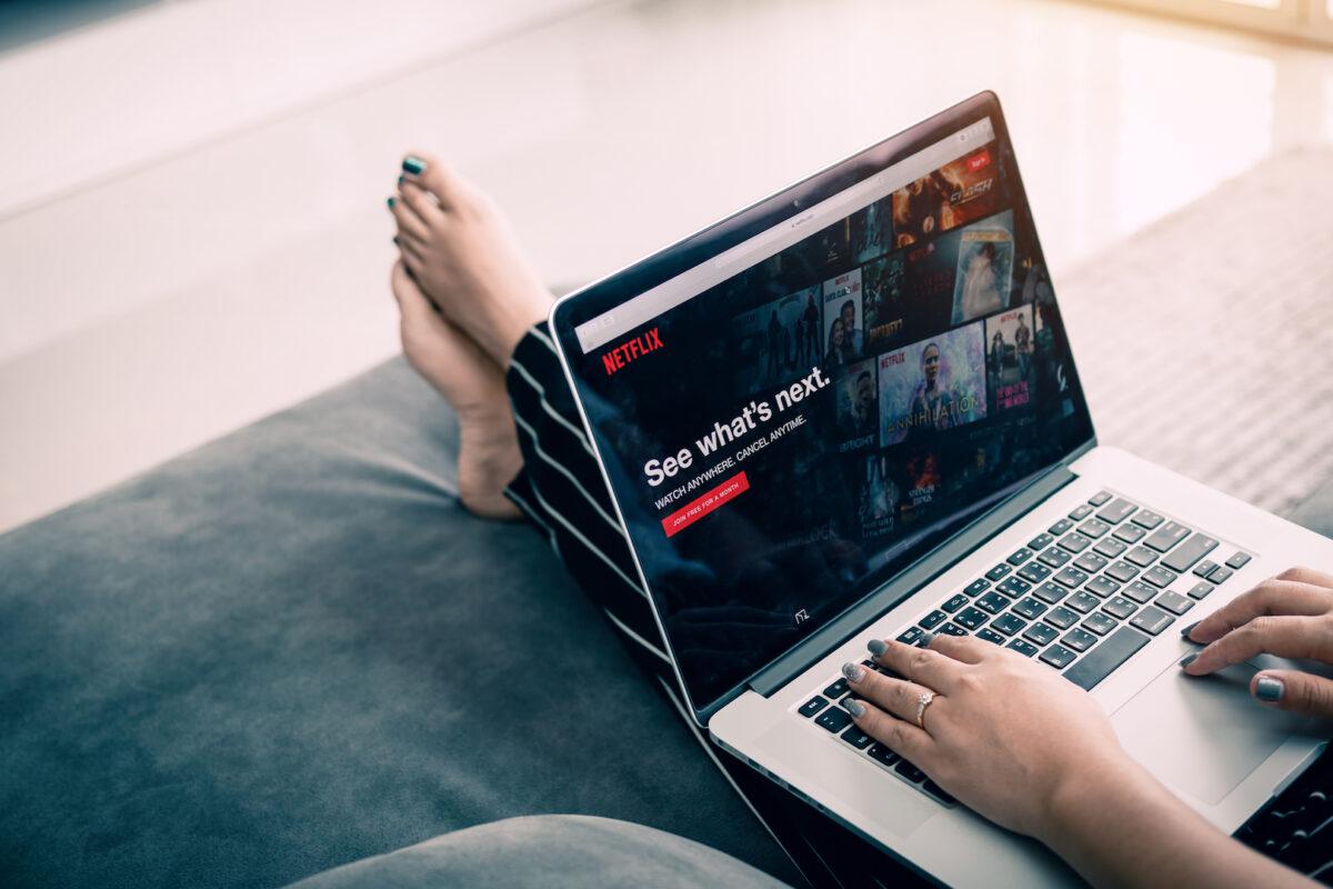 A Netflix user visits the streaming service on a laptop in this undated stock image.
