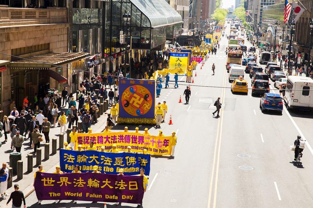Over 10,000 Falun Dafa practitioners from Europe, Asia, South America, Africa, and Oceania took part in the Falun Dafa Day parade in Manhattan, New York City, on May 16, 2019. (Ai Wen/The Epoch Times)