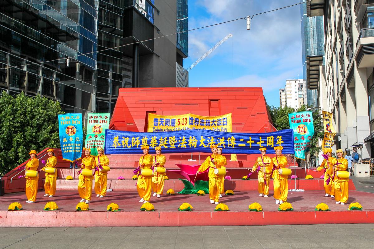 Falun Dafa practitioners celebrating the occasion at Queensbridge Square in Melbourne, Australia, on May 12, 2019. (The Epoch Times)