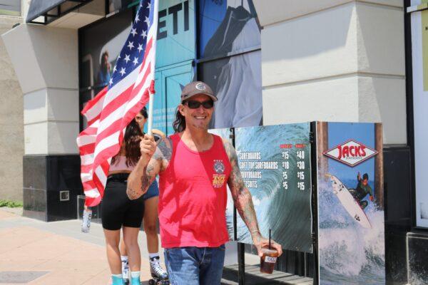 Kiki O’Bourke at a protest calling for the rapid reopening of California, in Huntington Beach, on May 9, 2020. (Jamie Joseph/The Epoch Times)